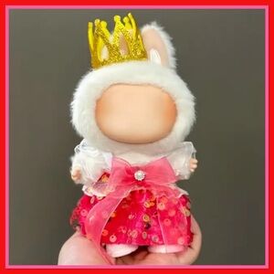 Cute Labubu with a Gold Crown and Pink Dress
